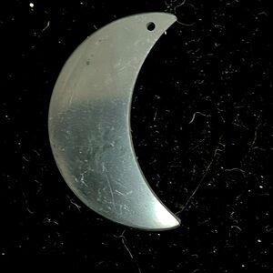 Shungite moon pendant. Natural carved polished stone